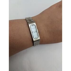 Vintage Bulova Women's Stainless Steel Band Watch with Gold Electroplated Bezel